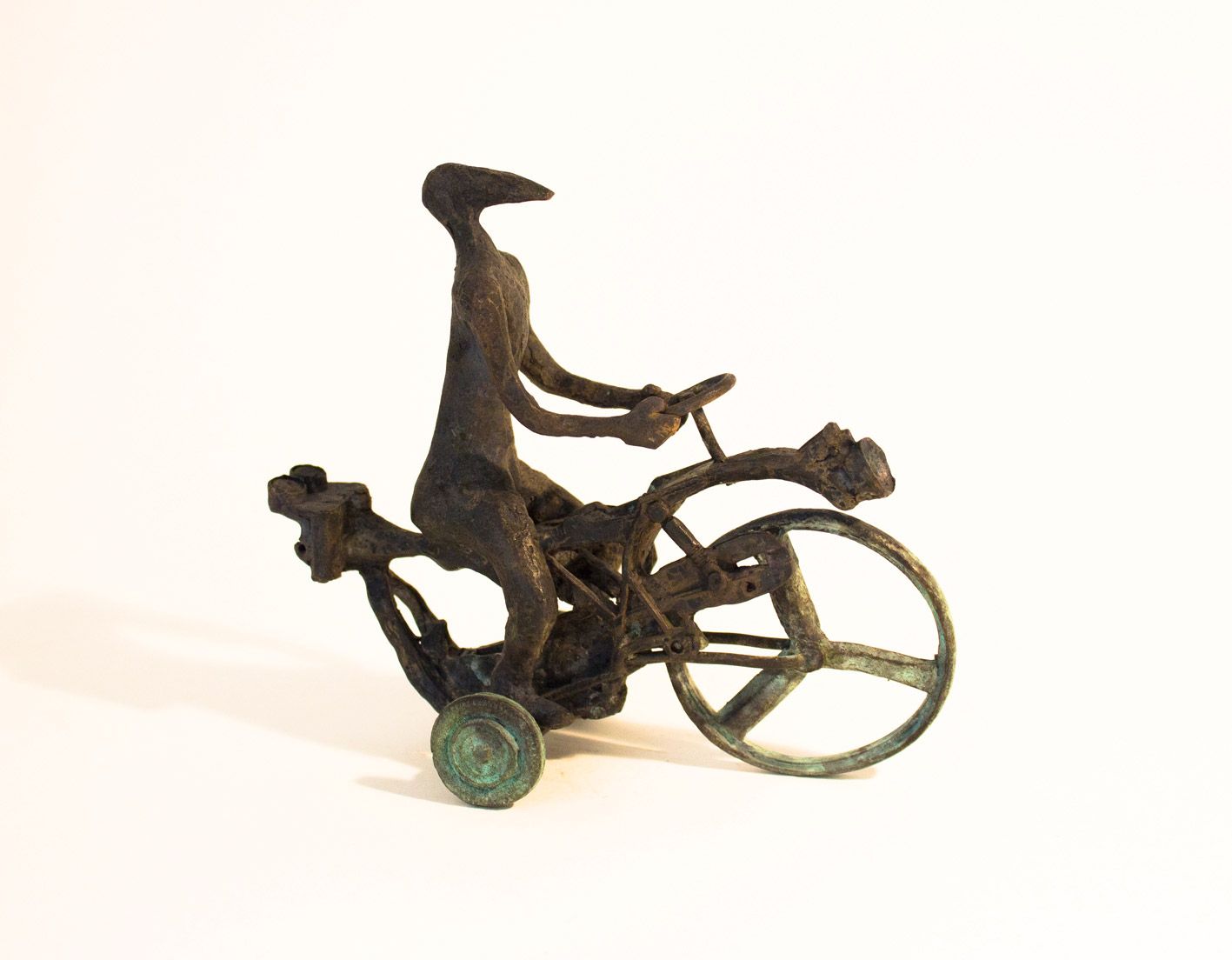 Older motorcyclist on a tricycle